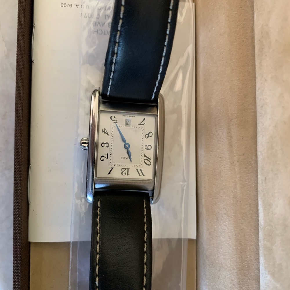 Coach women watch new in box. 3 bands included.